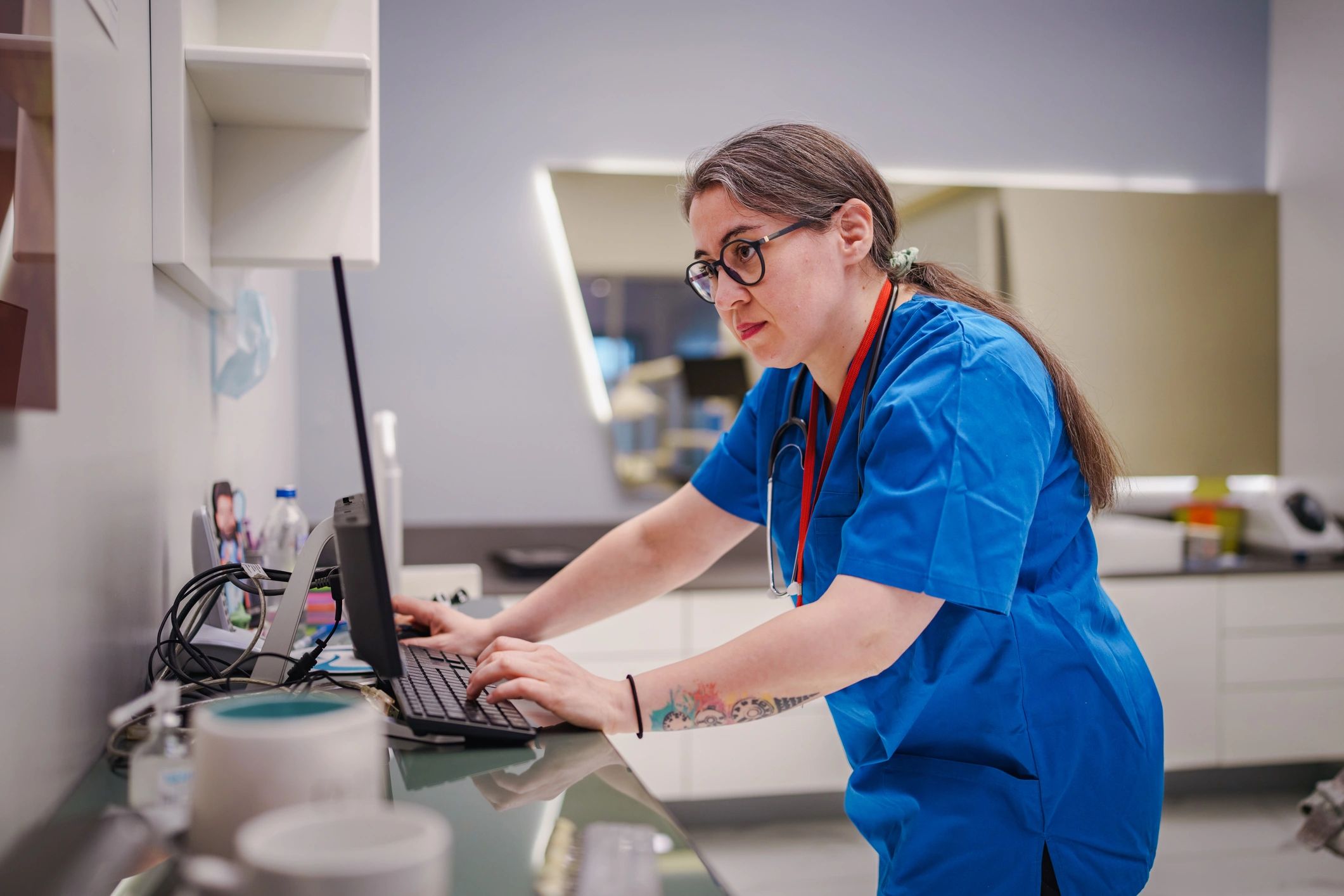 Healthcare professional using technology in a clinic setting